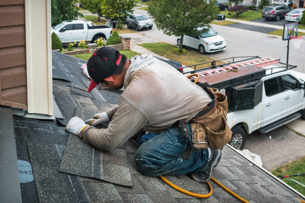 Professional Roofing technician working in Montesano, WA
